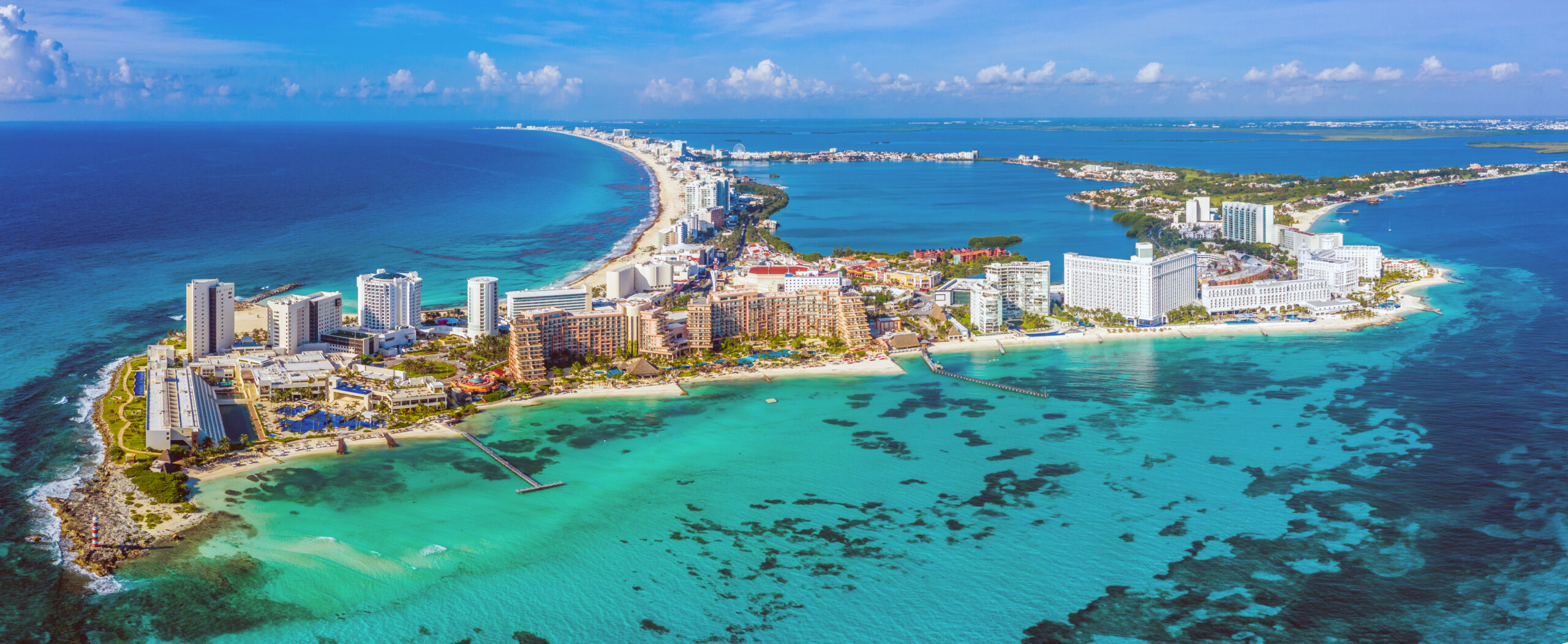 Aerial panoramic view of the northern peninsula of the Hotel Zone (Zona Hotelera) in Cancún, Mexico