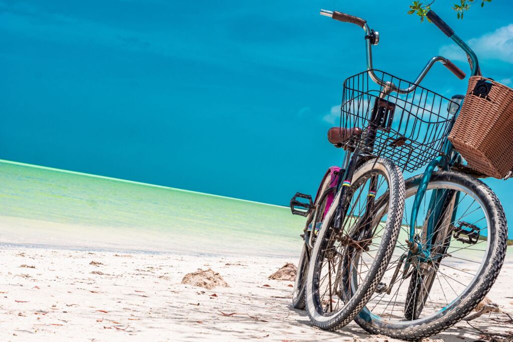 Turquoise bike parked at the beach, in the Mexican Caribbean. High quality photo