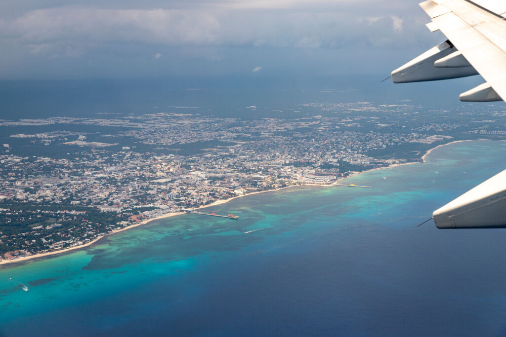 aerial view of Mexican city of Playa del Carmen and Caribbean shore